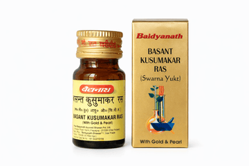 Baidyanath Basant Kusumakar Ras (Swarna Yukt) 10, 25 and 30 tablets golden outer packaging box and matching amber glass medicine bottle featuring a golden cap, yellow product label with English and Hindi text denoting "With Gold & Pearl," and a laboratory illustration | BodyStop