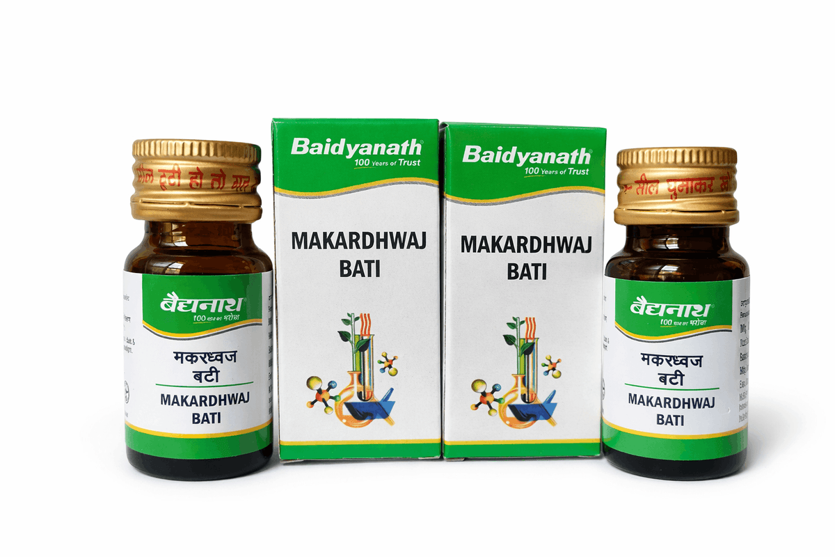 Baidyanath Makardhwaj Bati medicine bottles and their matching green and white packaging boxes showing the brand logo, product title, and herbal graphic | BodyStop