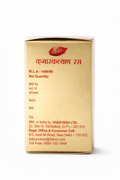Dabur Kumarkalyan Ras gold packaging box back panel displaying M.L.A-1408/86, Net Quantity, MRP, batch, mfd, exp fields, and manufacturer details for Dabur India Ltd. in Sahibabad, U.P. | BodyStop