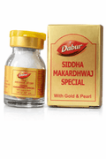 Dabur Siddha Makardhwaj Special 10 tablets (With Gold & Pearl) glass medicine bottle with a yellow cap alongside its matching gold outer packaging box featuring the Dabur brand logo | BodyStop