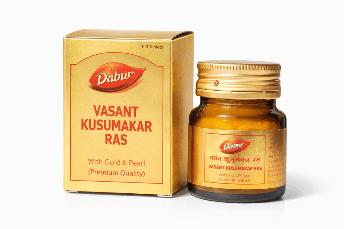 Dabur Vasant Kusumakar Ras with Gold & Pearl Premium Quality medicine box indicating 100 tablets alongside its amber glass bottle with a golden cap | BodyStop