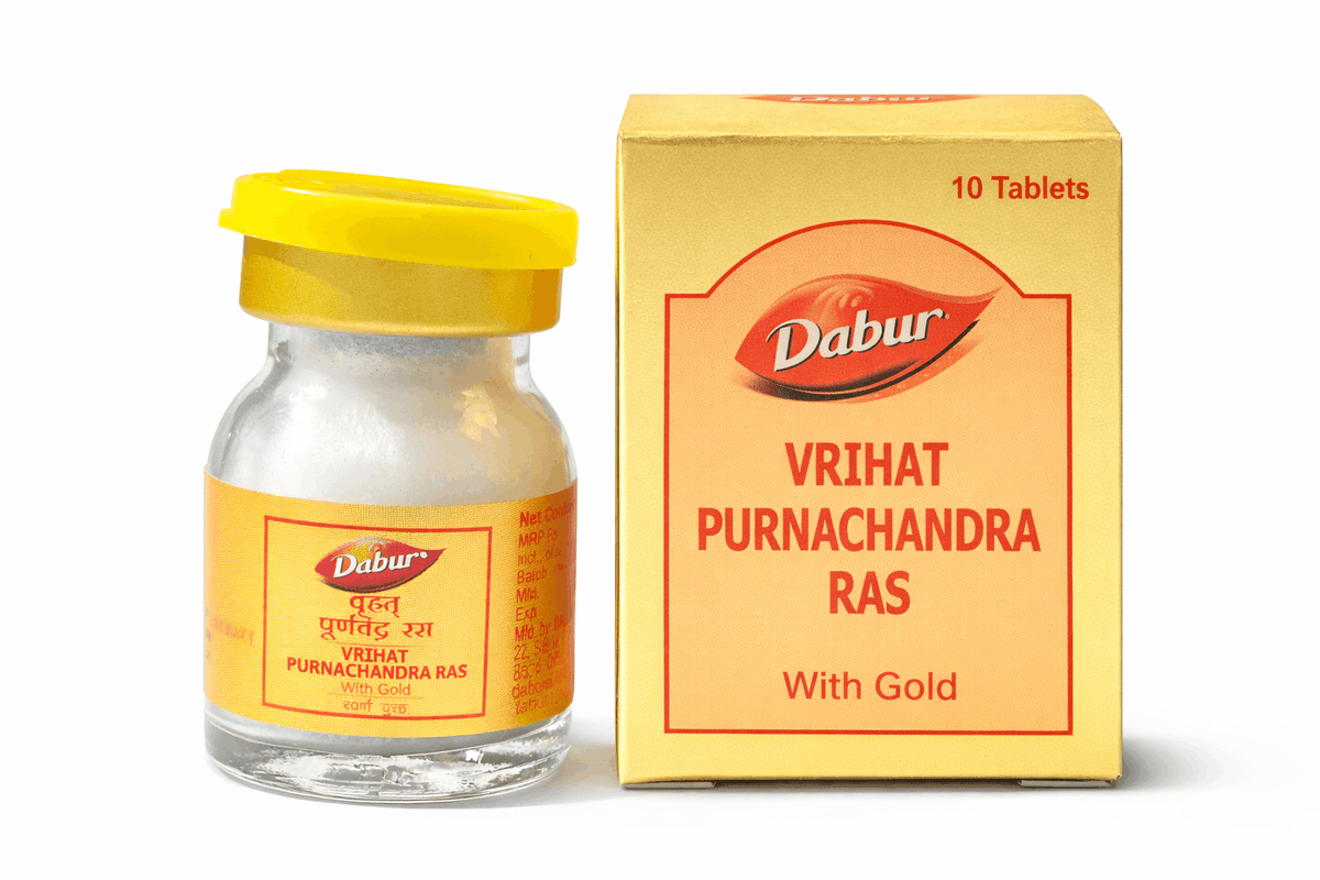 Dabur Vrihat Purnachandra Ras (With Gold) glass medicine bottle with a yellow cap next to its gold outer packaging box labeled with 10 Tablets and the Dabur brand logo | BodyStop
