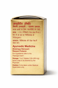 Dabur Vrihat Purnachandra Ras gold packaging box side panel displaying Ayurvedic medicine details, Bhaishajya Ratnawali / Rasayan Prakaran reference, dosage of 1 to 2 tablets (125-250mg) twice a day, and a caution to take under medical supervision | BodyStop