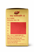 Dabur Vrihat Vatchintamani Ras gold packaging box back panel displaying manufacturing license number M.L. A-1408/86, Net Quantity of 10N tablets, regulatory fields, and manufacturer details for Dabur India Ltd. in Sahibabad, U.P.