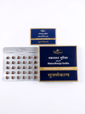 Dhootapapeshwar Makardhwaja Gutika tablets packaging showing product boxes, a product booklet, and a blister pack containing brown tablets | BodyStop