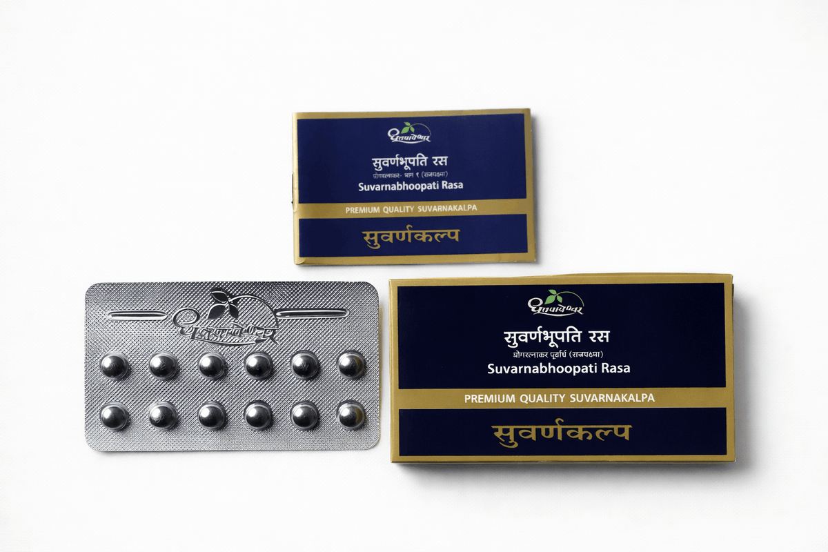 Dhootapapeshwar Suvarnabhoopati Rasa blister pack containing dark round pills alongside outer packaging boxes featuring the dark blue and gold Suvarnakalpa design | BodyStop